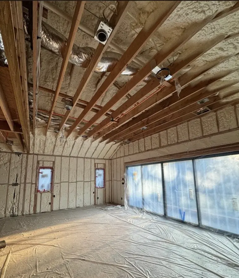 Interior walls and ceiling insulated with spray foam during new construction in Hammonton